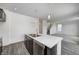Modern kitchen featuring an island with sink and stainless steel appliances, great for gatherings at 1952 White Oak Ln, Shelbyville, IN 46176