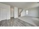 Spacious living room featuring hard surface flooring and plush carpet; a cozy and inviting space at 1952 White Oak Ln, Shelbyville, IN 46176
