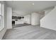 Open-concept living room features eat in kitchen, carpet, and staircase at 1952 White Oak Ln, Shelbyville, IN 46176