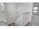 View of carpeted staircase featuring white walls and trim at 1952 White Oak Ln, Shelbyville, IN 46176