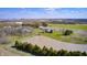 Panoramic aerial shot of the property, displaying its large pond, pastures, and the proximity to nearby amenities at 2009 W 250 N, Lebanon, IN 46052