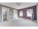 Bedroom features a ceiling fan, two windows, and an ensuite bath and walk-in closet at 2009 W 250 N, Lebanon, IN 46052