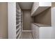 Walk-in closet includes built-in shelving, drawers and cabinets for maximum storage and organization at 2009 W 250 N, Lebanon, IN 46052