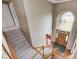 Grand foyer with high ceilings, hardwood floors, chandelier, and staircase at 2009 W 250 N, Lebanon, IN 46052