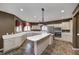 Well-lit kitchen with updated appliances, ample counter space, and stylish pendant lighting at 2009 W 250 N, Lebanon, IN 46052