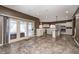 The kitchen has an island, stainless steel appliances, access to the backyard and a hot tub at 2009 W 250 N, Lebanon, IN 46052