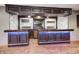 Beautiful wet bar has custom wood work, shelving, and stone backsplash at 2009 W 250 N, Lebanon, IN 46052