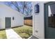 Private backyard with detached garage and new wooden fence at 2051 Columbia Ave, Indianapolis, IN 46202