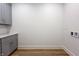 Modern laundry room with gray cabinets and ample counter space at 2051 Columbia Ave, Indianapolis, IN 46202