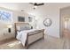 Inviting main bedroom with light-filled windows, ceiling fan, and neutral decor at 2051 Columbia Ave, Indianapolis, IN 46202