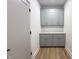 Mud room featuring gray cabinetry and luxury vinyl plank flooring at 2051 Columbia Ave, Indianapolis, IN 46202