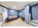 Cozy living room with neutral walls and wood-look floors at 215 S Warman Ave, Indianapolis, IN 46222