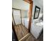 Laundry room with sink, mirror, washer, and dryer at 2233 W 28Th St, Anderson, IN 46016