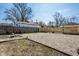 Large, fenced backyard offers privacy and ample space for outdoor activities and gardening at 2361 Southeastern Ave, Indianapolis, IN 46201