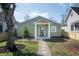 Charming home featuring new landscaping, sidewalk, and a covered entryway at 2361 Southeastern Ave, Indianapolis, IN 46201
