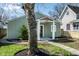 Charming home featuring new landscaping, sidewalk, and a covered entryway at 2361 Southeastern Ave, Indianapolis, IN 46201