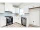 Beautiful kitchen featuring new stainless steel appliances and tiled backsplash at 2361 Southeastern Ave, Indianapolis, IN 46201