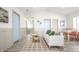 Bright living room with luxury floors, soft seating, and natural light at 2361 Southeastern Ave, Indianapolis, IN 46201