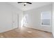 Bright bedroom has two windows, new paint and wood-look floors at 2362 English Ave, Indianapolis, IN 46201