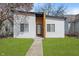 Charming home featuring a modern exterior, manicured lawn, and inviting walkway to the front door at 2362 English Ave, Indianapolis, IN 46201
