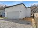 Freshly built garage with a clean white exterior and a neatly graveled parking area at 2362 English Ave, Indianapolis, IN 46201
