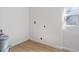 Bright laundry area ready for appliances with a window providing natural light at 2362 English Ave, Indianapolis, IN 46201