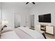 Bright bedroom has contemporary decor and an ensuite bath at 2362 English Ave, Indianapolis, IN 46201