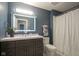 Modern bathroom with illuminated mirror, sleek vanity, and shower-tub combination, creating a relaxing space at 256 Strand Ln # Apt C, Avon, IN 46123