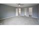 Spacious bedroom with plush gray carpet and walk in closet at 256 Strand Ln # Apt C, Avon, IN 46123