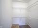 Spacious walk-in closet featuring a clean white interior, durable wire shelving, and ample storage space at 256 Strand Ln # Apt C, Avon, IN 46123