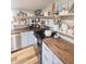 Stylish kitchen with butcher block countertops, stainless steel appliances, and open shelving at 316 Laurel St, Pendleton, IN 46064