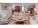 Cozy living room featuring a neutral color palette, hardwood floors, and comfortable seating at 316 Laurel St, Pendleton, IN 46064