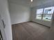 Neutral bedroom featuring plush carpet, a window with natural light and neutral walls at 3181 W Keepsake Ln, Monrovia, IN 46157