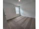Neutral bedroom featuring plush carpet, a window with blinds and neutral walls at 3181 W Keepsake Ln, Monrovia, IN 46157