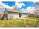 Backyard featuring a patio, privacy fence, and lush green grass at 4429 Tucson Dr, Indianapolis, IN 46241