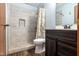 Bathroom featuring a tiled shower with niche and modern vanity at 4429 Tucson Dr, Indianapolis, IN 46241