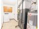 The utility room has a washer, dryer, water heater and storage at 4429 Tucson Dr, Indianapolis, IN 46241