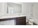 Bathroom featuring a modern vanity with a large mirror and combined shower and tub at 4712 E Shadowbrook Dr, Camby, IN 46113