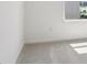 Bright bedroom featuring neutral carpet and a large window for ample natural light at 4712 E Shadowbrook Dr, Camby, IN 46113