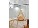 Playful basement area featuring a teepee, beanbag chair, and a small table with chairs at 5226 E St Clair St, Indianapolis, IN 46219