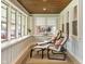 Serene sunroom featuring comfortable seating, natural light, and a relaxing atmosphere at 5226 E St Clair St, Indianapolis, IN 46219