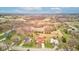 Serene aerial perspective highlighting homes near a cul-de-sac, set amidst a tranquil community with mature trees at 528 Wind Skip Cir, Westfield, IN 46074