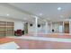 A large basement area, bathed in light, features built-in bookshelves and stylish design touches at 528 Wind Skip Cir, Westfield, IN 46074
