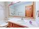 Bathroom featuring a large mirror over a vanity and sink, next to a tub and shower combination at 528 Wind Skip Cir, Westfield, IN 46074