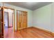 Bedroom with access to other rooms and a closet with wooden doors at 528 Wind Skip Cir, Westfield, IN 46074