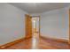Bedroom featuring hardwood floors with an ensuite bathroom visible in the doorway at 528 Wind Skip Cir, Westfield, IN 46074
