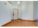 Bright foyer with white walls, wood trim and parquet floors leading into the home at 528 Wind Skip Cir, Westfield, IN 46074