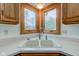 Traditional kitchen featuring a double bowl sink and natural lighting from corner windows at 528 Wind Skip Cir, Westfield, IN 46074