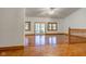 Spacious living room with hardwood floors, natural light, and a seamless flow to the outside at 528 Wind Skip Cir, Westfield, IN 46074