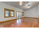 Inviting living room featuring hardwood floors, vaulted ceiling, and sliding glass doors to the backyard at 528 Wind Skip Cir, Westfield, IN 46074